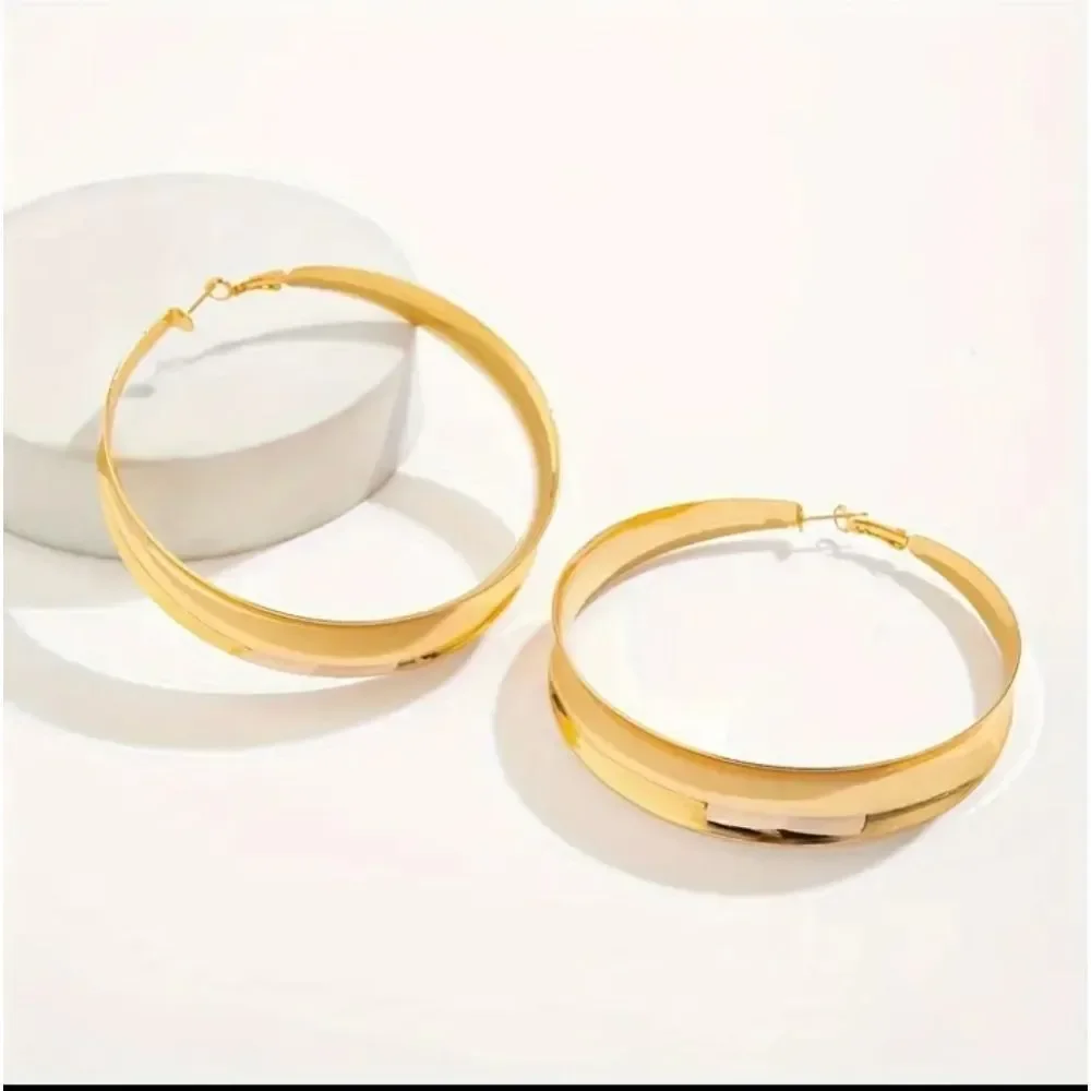 Exaggerated Gold Hoop Earrings